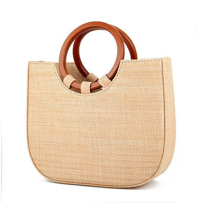 Borsa da donna tessuta con maniglia in legno e erba per il tempo libero con disegni di moda