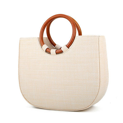 Borsa da donna tessuta con maniglia in legno e erba per il tempo libero con disegni di moda