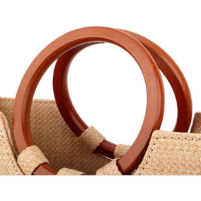 Borsa da donna tessuta con maniglia in legno e erba per il tempo libero con disegni di moda