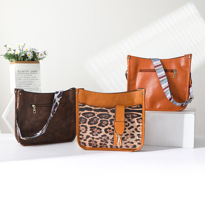 Borsa da spalla femminile in pelle vegana con cintura per chitarra e maniglia singola