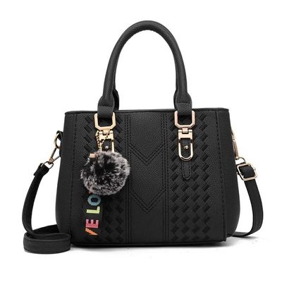 Elegante borsa da spalla in pelle vera con disegno di animazione e decorazione dei pulsanti