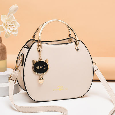Borsa da mano da donna alla moda con spalla singola con ciondolo per gatti e chiusura a cerniera