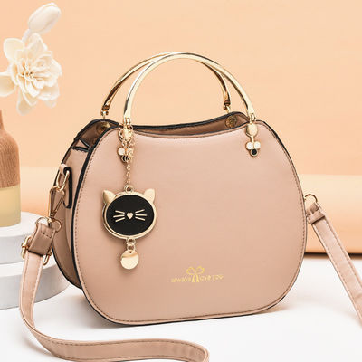 Borsa da mano da donna alla moda con spalla singola con ciondolo per gatti e chiusura a cerniera